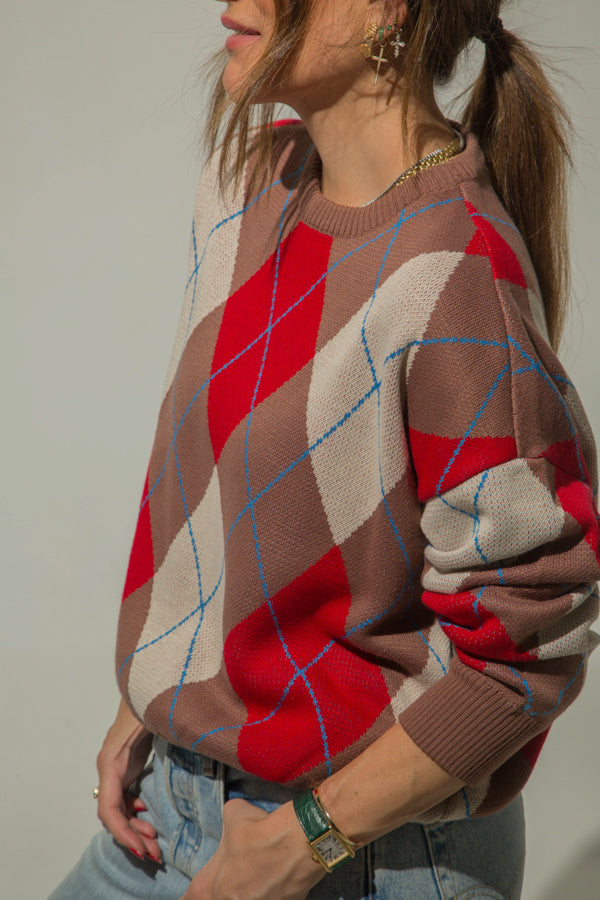 
                  
                    IRIS KNITTED SWEATER
                  
                