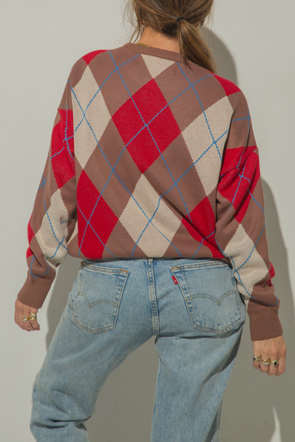 
                  
                    IRIS KNITTED SWEATER
                  
                